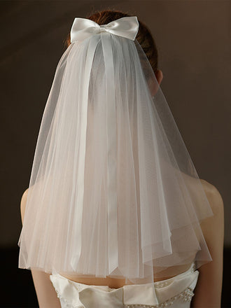 Voile de mariée blanc avec nœud vintage