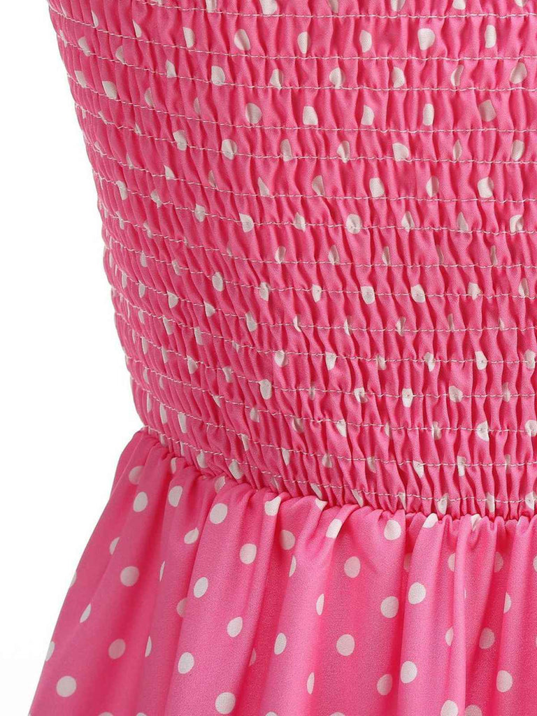 Robe swing ceinturée col halter à pois années 50