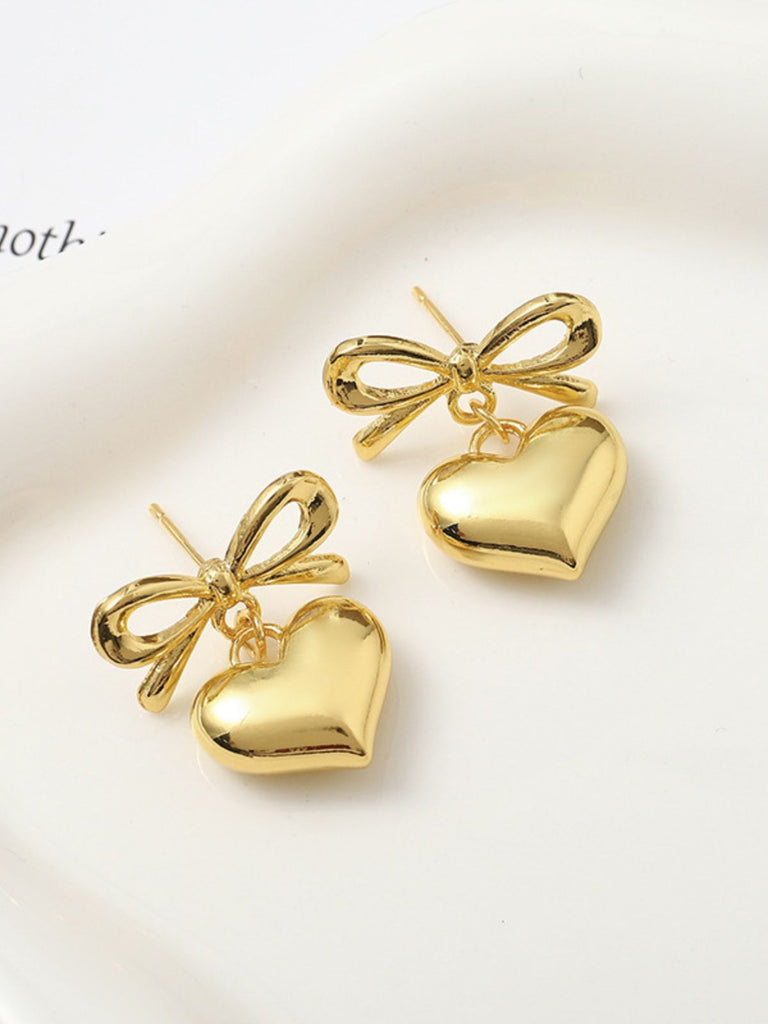 Boucles d'oreilles pendantes en alliage avec nœud en forme de cœur
