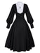 Robe noire style nonne avec collier croisé des années 1940