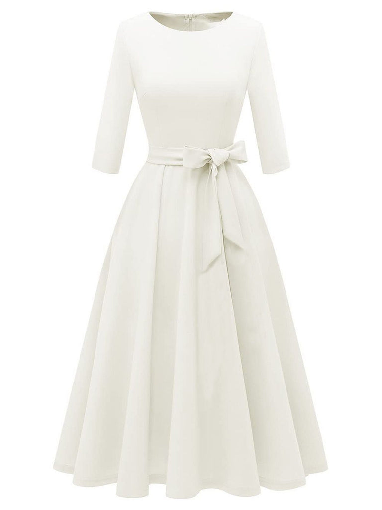 Robe trapèze manches trois-quarts à nœud papillon années 1940