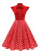 Robe noire trapèze à pois col nœud manches cape années 1950