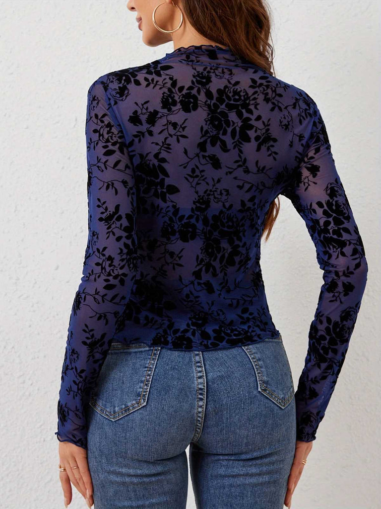 Haut à col roulé court en maille florale floquée des années 1970