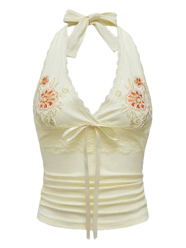 Haut dos nu fleuri en dentelle brodée ivoire années 1980