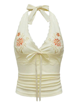 Haut dos nu fleuri en dentelle brodée ivoire années 1980