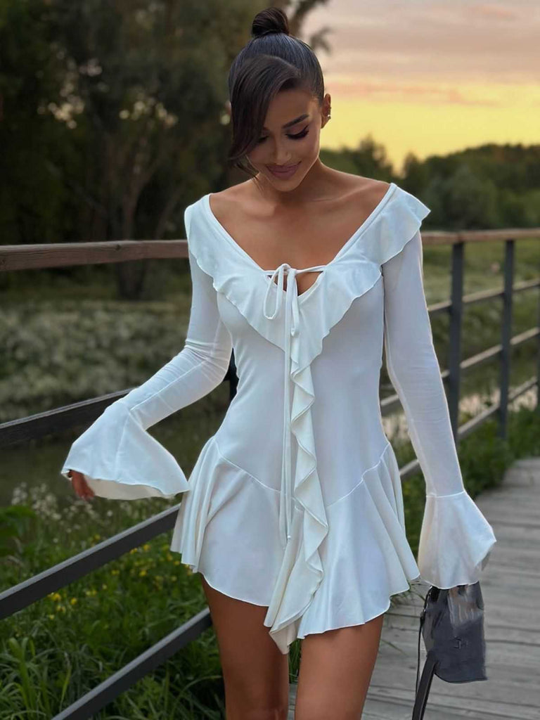 Robe rose col en V et manches évasées volants années 60