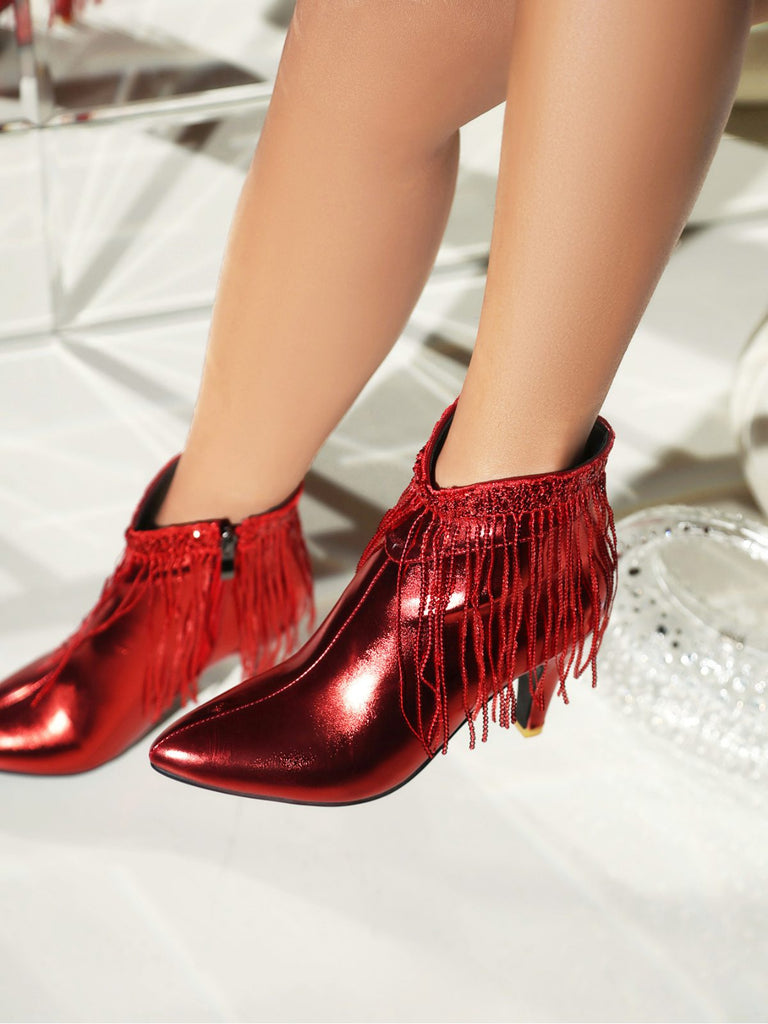 Bottines Chelsea à bout pointu et pompons métalliques