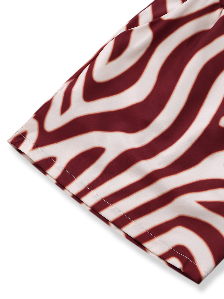Fabric with red and white zebra pattern on a white background