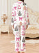 Ensemble de pyjama blanc de Noël avec des cannes de bonbon des années 1940