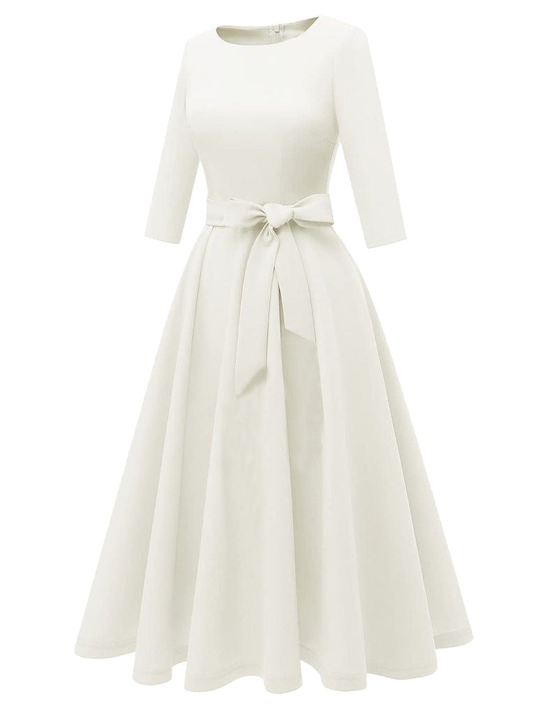 Robe trapèze manches trois-quarts à nœud papillon années 1940