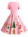 Robe trapèze rose motif flocon de neige des années 1950