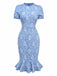 Robe bleu clair marguerites à manches bouffantes années 1960
