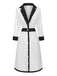 Robe boutonnée à col en V profond blanche et noire années 1940