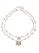 Collier superposé en coquillages perles et étoiles de mer