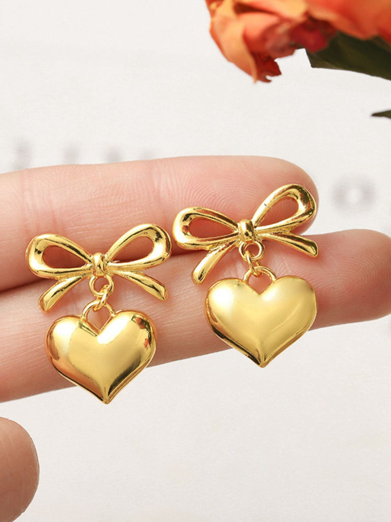 Boucles d'oreilles pendantes en alliage avec nœud en forme de cœur