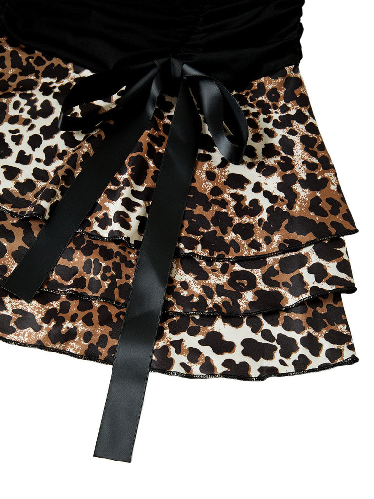 Robe courte portefeuille léopard à volants et nœud papillon années 80