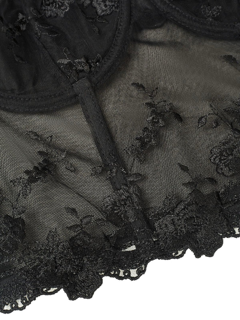 Haut corset en dentelle noir à manches bouffantes des années 1970