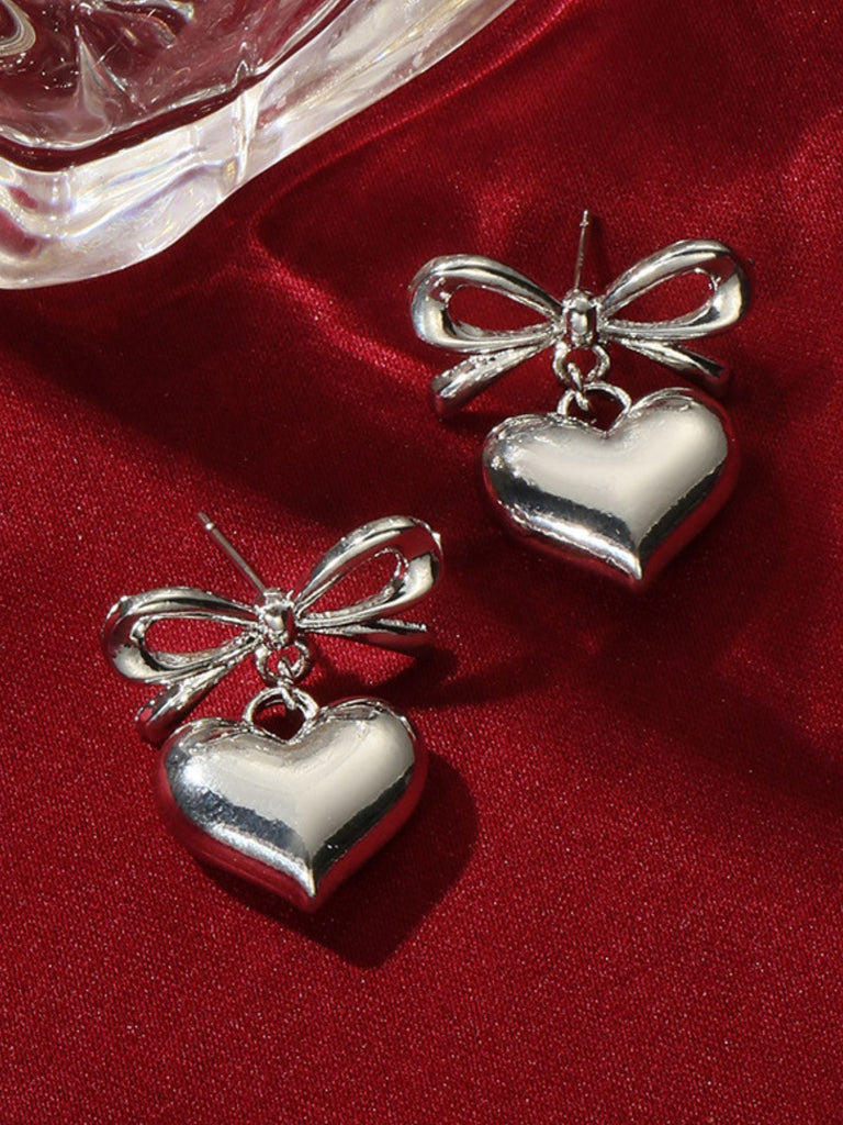 Boucles d'oreilles pendantes en alliage avec nœud en forme de cœur
