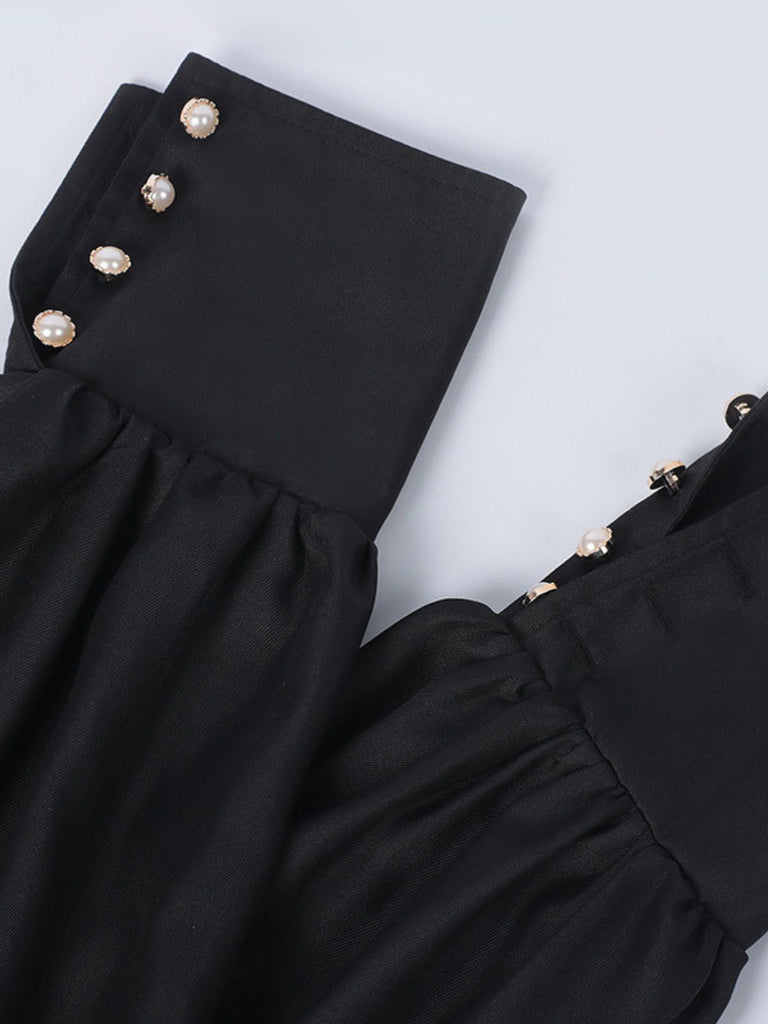 Robe noire style nonne avec collier croisé des années 1940