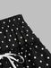 Black polka dot mini skirt waist detail with lace ruffle design