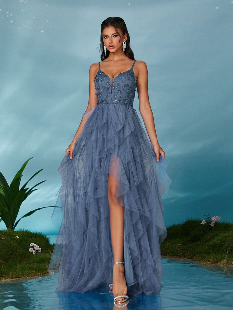 Glamorous tiered evening gown with 1930s styling, delicate appliqué work, sparkling tulle fabric and thigh-high slit perfect for prom and formal occasions
