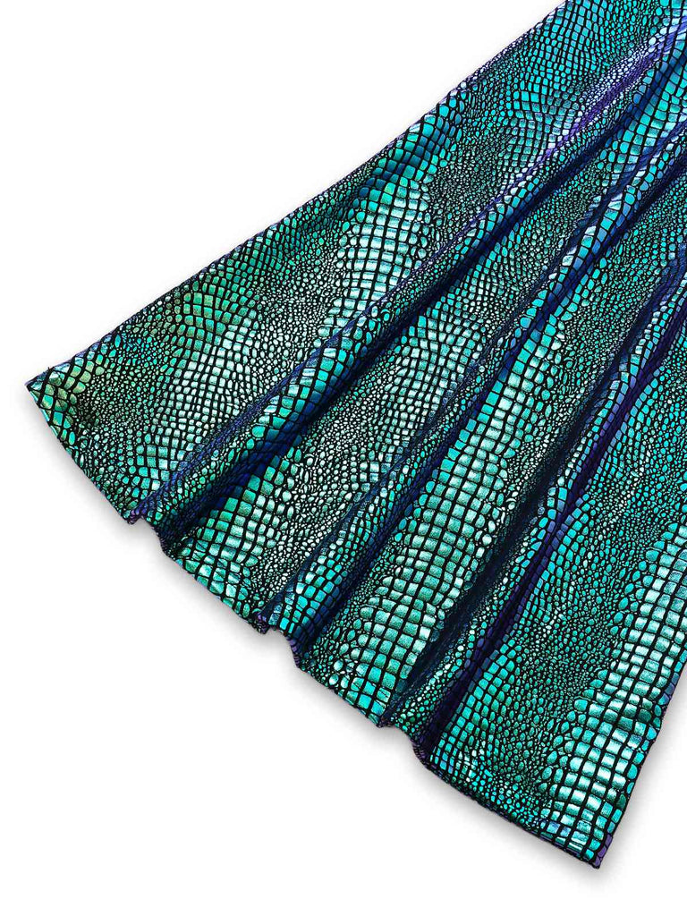 Teal fabric with a textured pattern on a white background