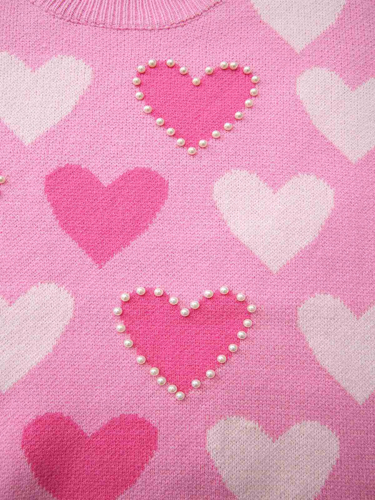 Pull rose perles en forme de cœur années 1950