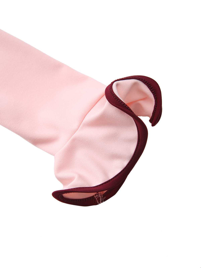 Robe rose manches longues et ourlet volants style années 60