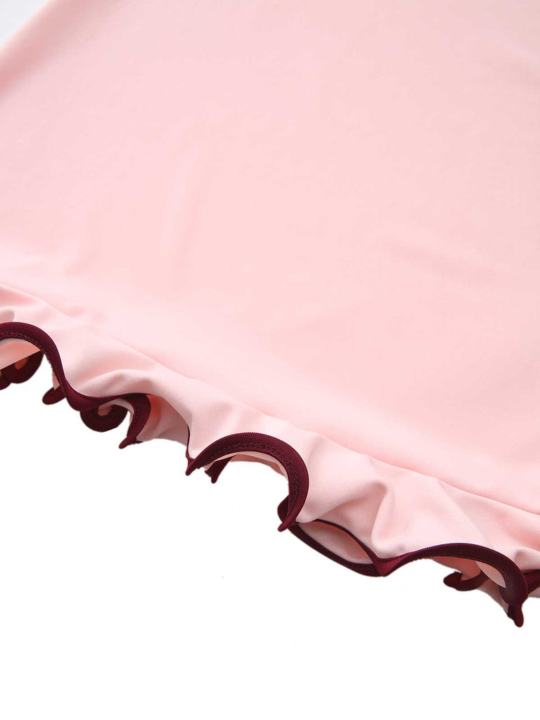Robe rose manches longues et ourlet volants style années 60