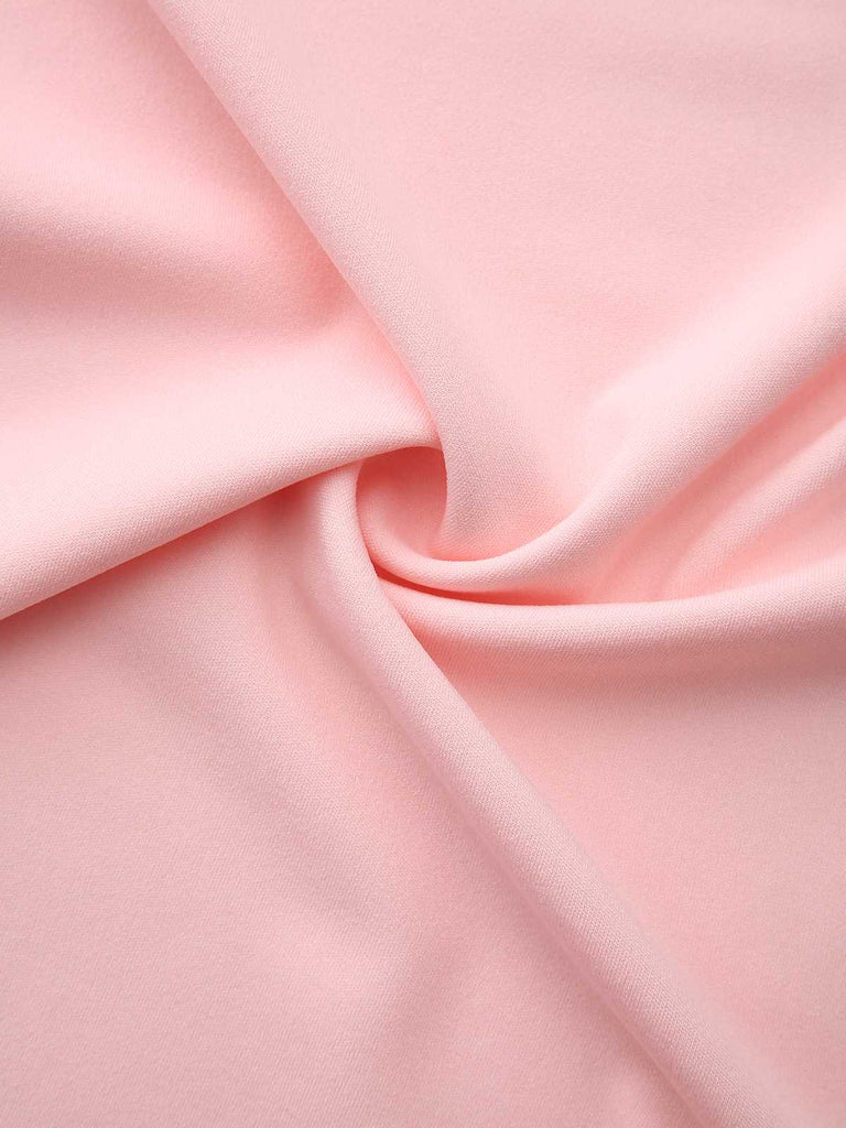 Robe rose manches longues et ourlet volants style années 60