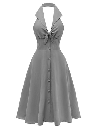Gray halter swing dress front view displaying flowy silhouette perfect for casual summer wear