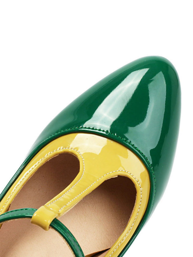 Green and yellow patent leather shoe on a white background