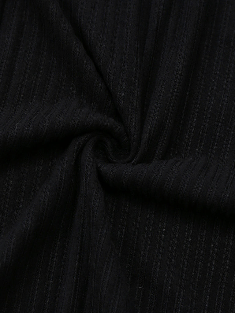 Robe en maille côtelée noire bordure en fausse fourrure léopard style années 1940