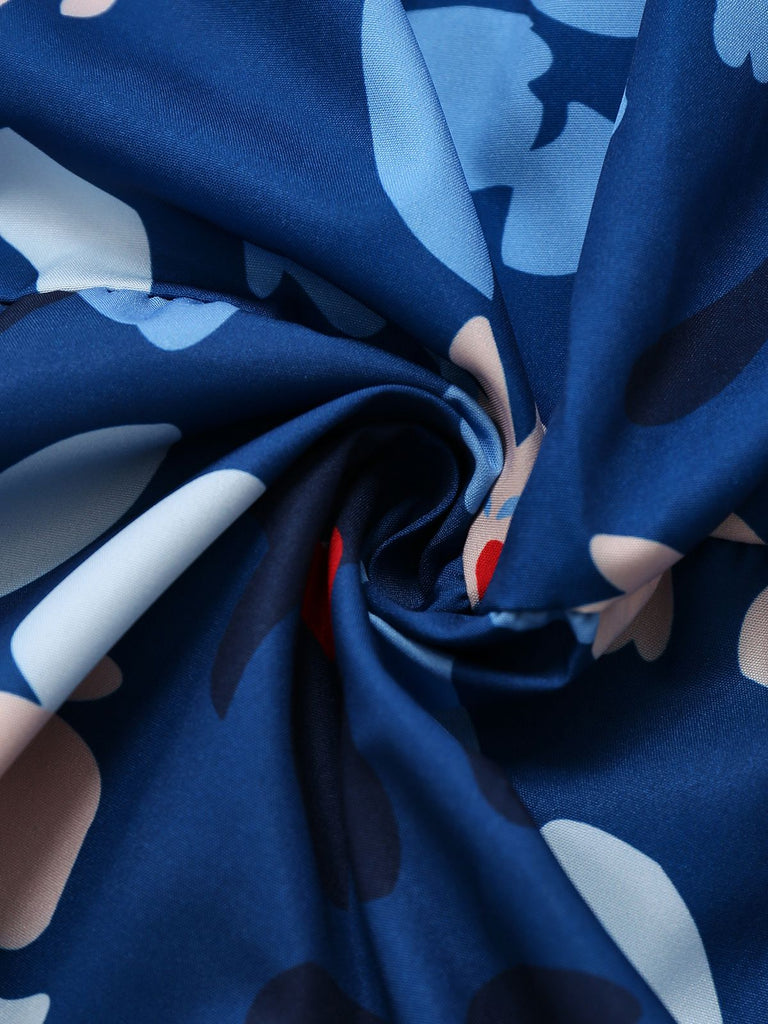 Robe bleue à fleurs manches bouffantes épaules dénudées années 1940