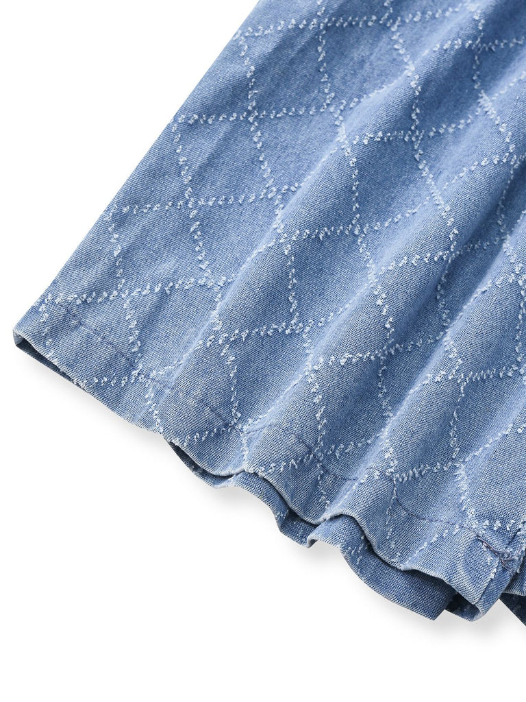 Combishort utilitaire en jean bleu avec boutons années 1980