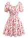 Robe manches bouffantes imprimé fleurs roses taille smockée des années 1950