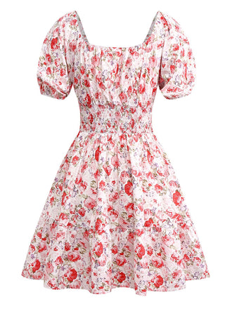 Robe manches bouffantes imprimé fleurs roses taille smockée des années 1950