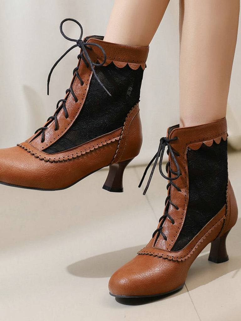 Brown lace-up boots with black accents on a neutral background