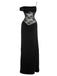 Vue de face en studio de la robe maxi noire avec un corsage en dentelle blanche.