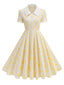 Robe beige à pois et boutons à revers des années 1950
