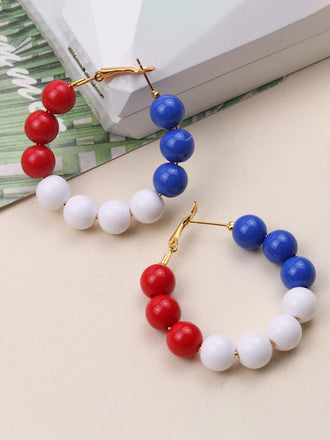 Boucles d'oreilles vintage en boules rouge blanche et bleue