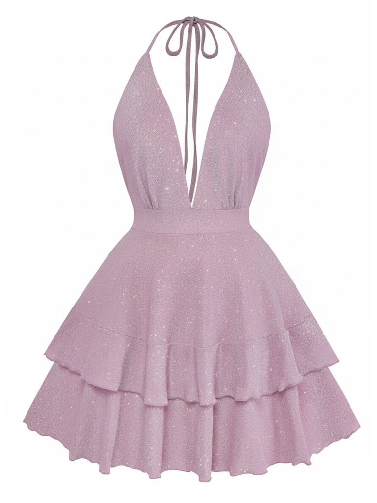 Mauve halter neck dress with ruffled layers on a white background