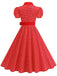 Vintage polka dot belted swing dress with shirt collar in classic 1950s retro style