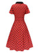 Robe rouge foncé à col en V et à pois des années 1950