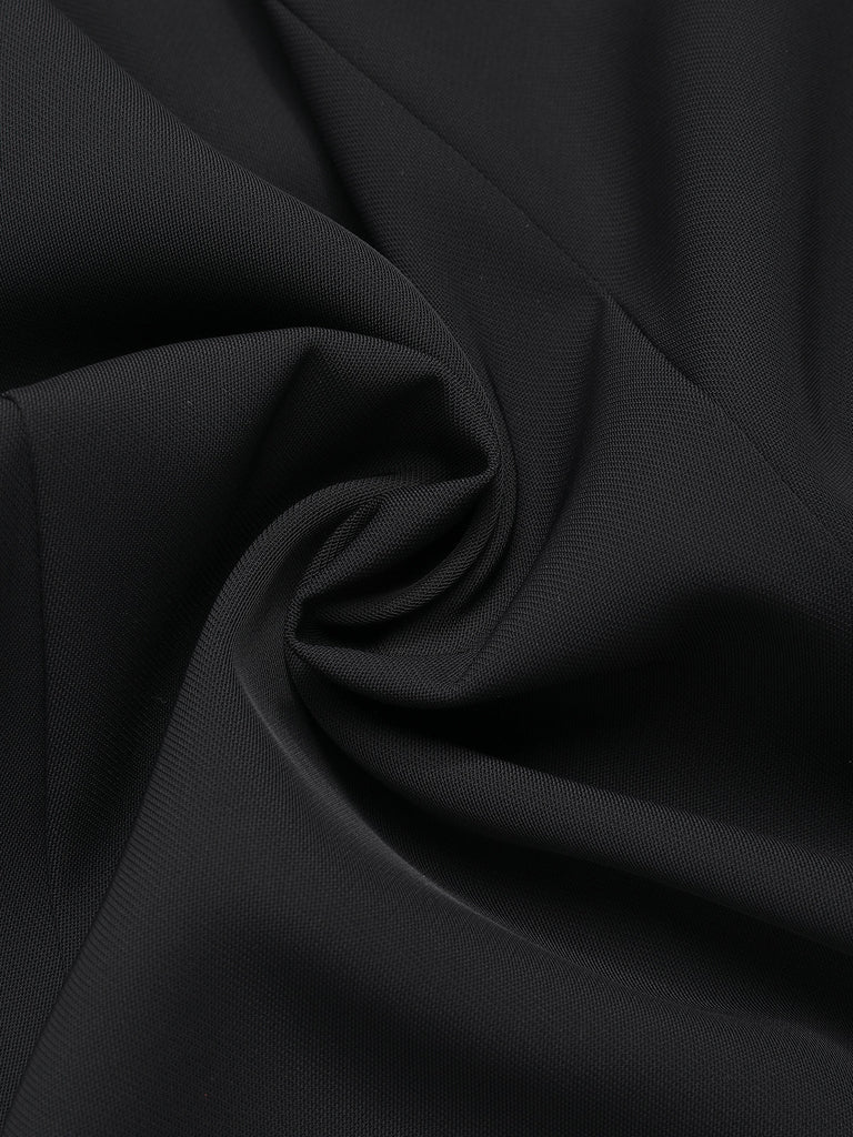 Robe noire patchwork à col bateau et touches de piano des années 1960