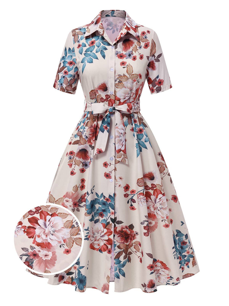 Robe  revers ceinturée à fleurs abricot des années 1940