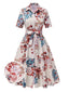 Robe  revers ceinturée à fleurs abricot des années 1940