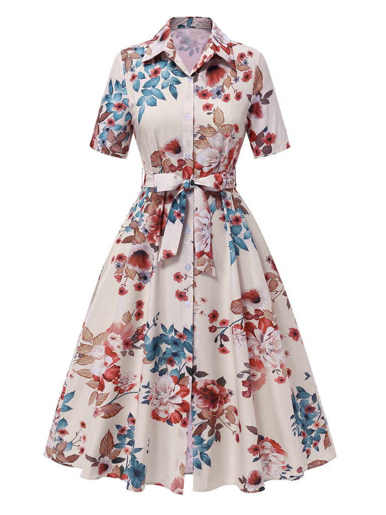 Robe  revers ceinturée à fleurs abricot des années 1940