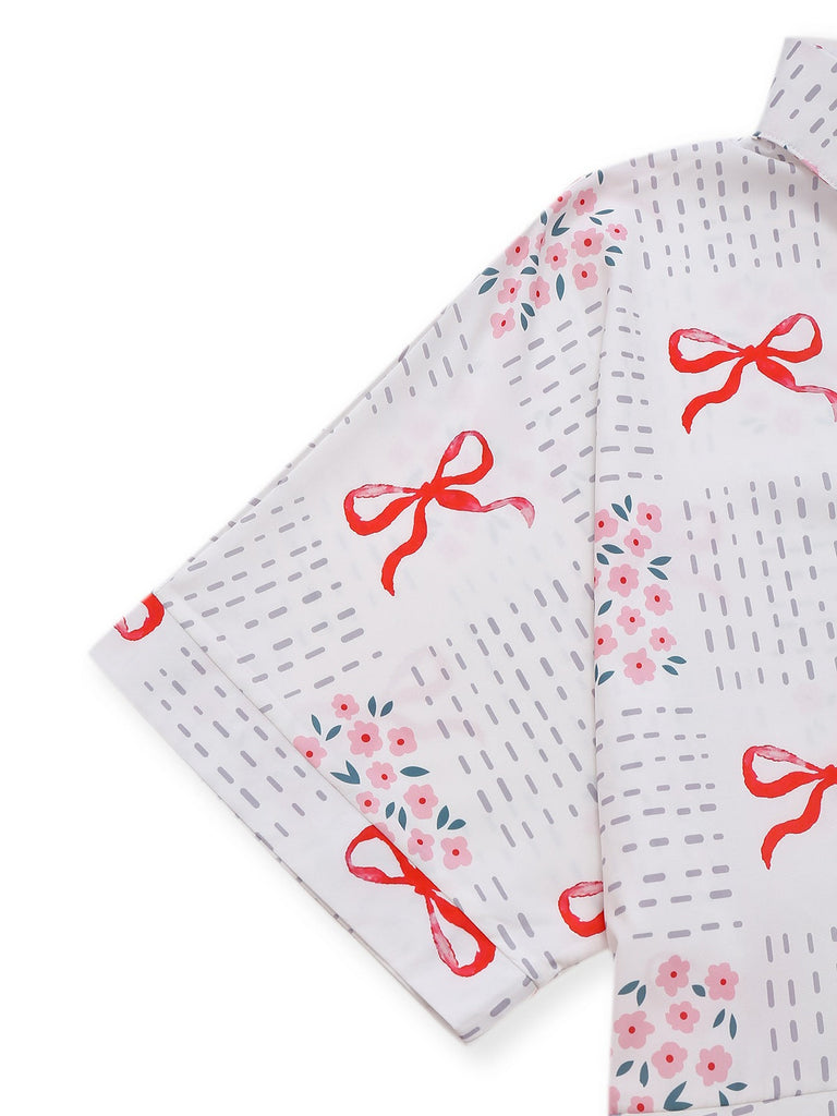 Combishort rose revers motif nœud et florale avec ceinture années 1950