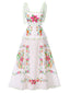 Robe blanche imprimé floral avec lien au dos des années 1940